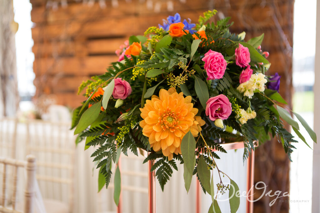 Wedding flower bouquet on church plinth.